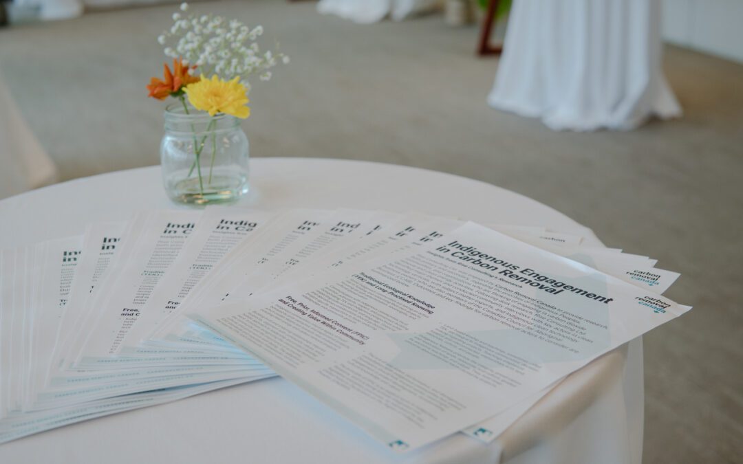 Copies of report on table