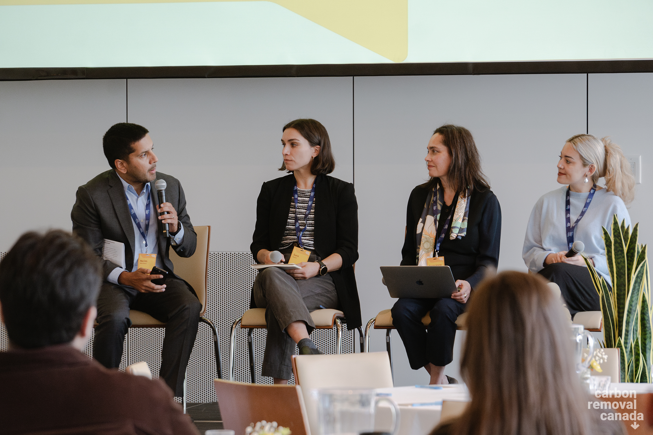 Panel featuring a man and three women 